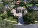 Luxury home with large backyard and circular driveway at 667 Richmond Close, Tarpon Springs, FL 34688