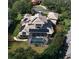 Property showcasing home and solar panels at 667 Richmond Close, Tarpon Springs, FL 34688