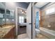 Bathroom with shower and tub, adjacent to bedroom at 667 Richmond Close, Tarpon Springs, FL 34688