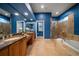 Luxurious bathroom with double vanity and soaking tub at 667 Richmond Close, Tarpon Springs, FL 34688