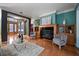 Elegant living room with fireplace and built-in shelving at 667 Richmond Close, Tarpon Springs, FL 34688