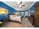 Bright main bedroom with a large window and plenty of closet space at 667 Richmond Close, Tarpon Springs, FL 34688