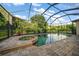 Relaxing screened pool area at 667 Richmond Close, Tarpon Springs, FL 34688