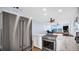 Kitchen with stainless steel appliances and marble countertops at 9 Haig Pl # 806, Dunedin, FL 34698