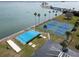 Community view with tennis courts, shuffleboard, and a beach at 9 Haig Pl # 806, Dunedin, FL 34698