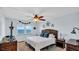 Ocean view bedroom with a king-size bed and rattan furniture at 9 Haig Pl # 806, Dunedin, FL 34698