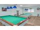 Game room with two pool tables at 9 Haig Pl # 806, Dunedin, FL 34698