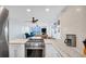 Modern kitchen with stainless steel appliances and waterfront views at 9 Haig Pl # 806, Dunedin, FL 34698