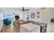 Modern kitchen with marble countertops and stainless steel appliances at 9 Haig Pl # 806, Dunedin, FL 34698