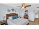 Primary bedroom with king-size bed and ocean view at 9 Haig Pl # 806, Dunedin, FL 34698