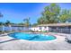 Inviting kidney-shaped pool surrounded by lush landscaping at 9252 81St Ave, Seminole, FL 33777