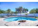 Kidney-shaped pool with surrounding patio and lush tropical landscaping at 9252 81St Ave, Seminole, FL 33777