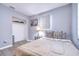 Cozy bedroom with a comfortable bed, closet, and window at 9252 81St Ave, Seminole, FL 33777