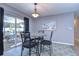Dining area with table and chairs, pool view at 9252 81St Ave, Seminole, FL 33777