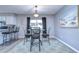 Bright dining area with table, chairs, and access to backyard at 9252 81St Ave, Seminole, FL 33777