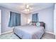 Spacious bedroom with king-size bed and ceiling fan at 9252 81St Ave, Seminole, FL 33777