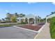 Well maintained gated entrance, with beautiful landscaping offering security and curb appeal for the community at 7979 Sailboat Key S Blvd # 506, South Pasadena, FL 33707