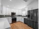 Contemporary kitchen featuring white shaker cabinets and new appliances at 2347 Eastwood Dr, Clearwater, FL 33765
