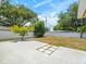 Large backyard with patio and grassy area at 2347 Eastwood Dr, Clearwater, FL 33765