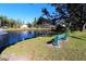 Scenic pond with a bench and fountain feature at 4001 58Th N St # 3, Kenneth City, FL 33709