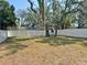 Fenced backyard with mature trees and open space at 3985 56Th N Ave, St Petersburg, FL 33714