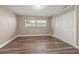 Spacious bedroom with hardwood floors and double door closet at 800 Pasadena S Ave, St Petersburg, FL 33707
