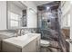 Updated bathroom with a walk-in shower and modern vanity at 800 Pasadena S Ave, St Petersburg, FL 33707