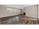 Bright living room with hardwood floors and neutral walls at 800 Pasadena S Ave, St Petersburg, FL 33707