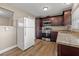 Updated kitchen with stainless steel appliances and wood cabinets at 800 Pasadena S Ave, St Petersburg, FL 33707