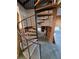 Unique spiral staircase leading to upper level with bathroom under construction at 165 97Th Ne Ave, St Petersburg, FL 33702