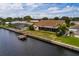 Aerial view of a waterfront house with a private dock at 165 97Th Ne Ave, St Petersburg, FL 33702