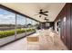 Spacious screened porch overlooking the water, perfect for relaxing and enjoying the view at 165 97Th Ne Ave, St Petersburg, FL 33702