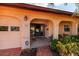 Front entry with a covered porch and brick walkway at 165 97Th Ne Ave, St Petersburg, FL 33702