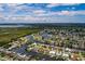 Aerial view of waterfront home with private dock and lush landscaping at 165 97Th Ne Ave, St Petersburg, FL 33702