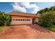 Single-story home with a brick driveway and well-maintained landscaping at 165 97Th Ne Ave, St Petersburg, FL 33702