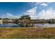 Scenic view of waterfront homes and boats along a peaceful canal at 165 97Th Ne Ave, St Petersburg, FL 33702