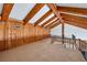 Open loft area featuring wood-paneled walls and wood beam ceilings at 165 97Th Ne Ave, St Petersburg, FL 33702