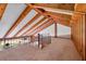 Spacious loft area with wood-paneled walls and wood beams at 165 97Th Ne Ave, St Petersburg, FL 33702