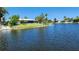 Stunning view of the canal and neighborhood homes from the water at 3627 Ortona Dr, Holiday, FL 34691