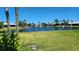 Beautiful backyard with water view and lush lawn at 3627 Ortona Dr, Holiday, FL 34691