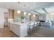 Modern kitchen with a large island and white cabinetry at 1254 Cordova Ne Blvd, St Petersburg, FL 33704