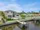 Luxury waterfront home with private dock and pool; spacious backyard at 1254 Cordova Ne Blvd, St Petersburg, FL 33704
