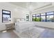 Bright main bedroom with large windows and hardwood floors at 1254 Cordova Ne Blvd, St Petersburg, FL 33704