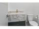 Powder room with floating vanity and modern fixtures at 1254 Cordova Ne Blvd, St Petersburg, FL 33704