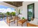 Relaxing outdoor patio overlooking the canal, complete with seating and a grill at 1254 Cordova Ne Blvd, St Petersburg, FL 33704