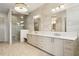 Spa-like bathroom with double vanity, large shower, and modern fixtures at 1254 Cordova Ne Blvd, St Petersburg, FL 33704