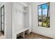 Modern entryway with built-in bench and storage at 1254 Cordova Ne Blvd, St Petersburg, FL 33704