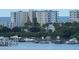 View of waterfront with boats and buildings at 255 Dolphin Pt # 809, Clearwater, FL 33767