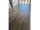 Bright living room featuring new luxury vinyl plank flooring and water views at 255 Dolphin Pt # 809, Clearwater, FL 33767