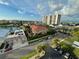 Aerial view of property, street, and waterway at 255 Dolphin Pt # 809, Clearwater, FL 33767